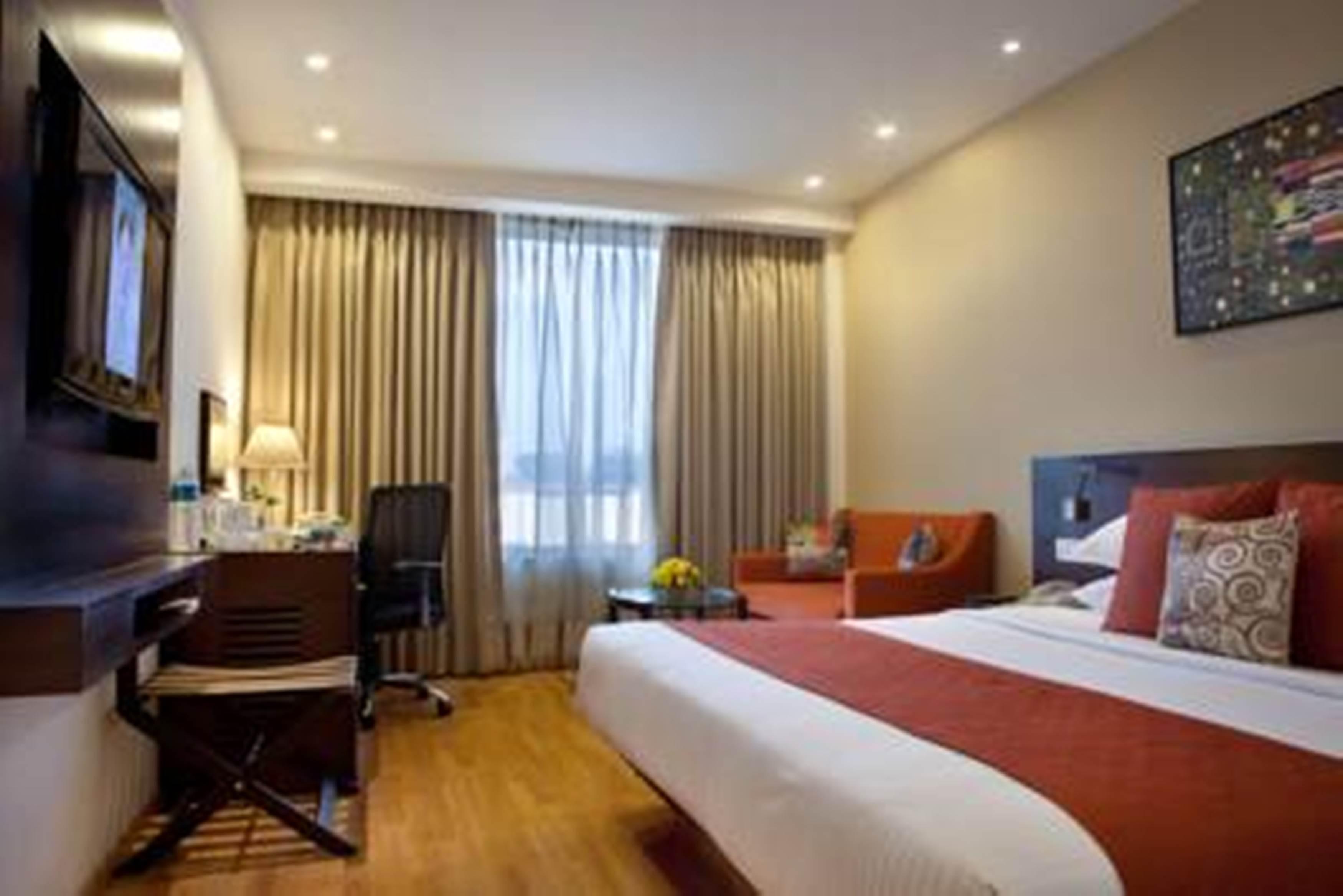 Lemon Tree Premier, Delhi Airport Hotel Új-Delhi Kültér fotó A room at the hotel