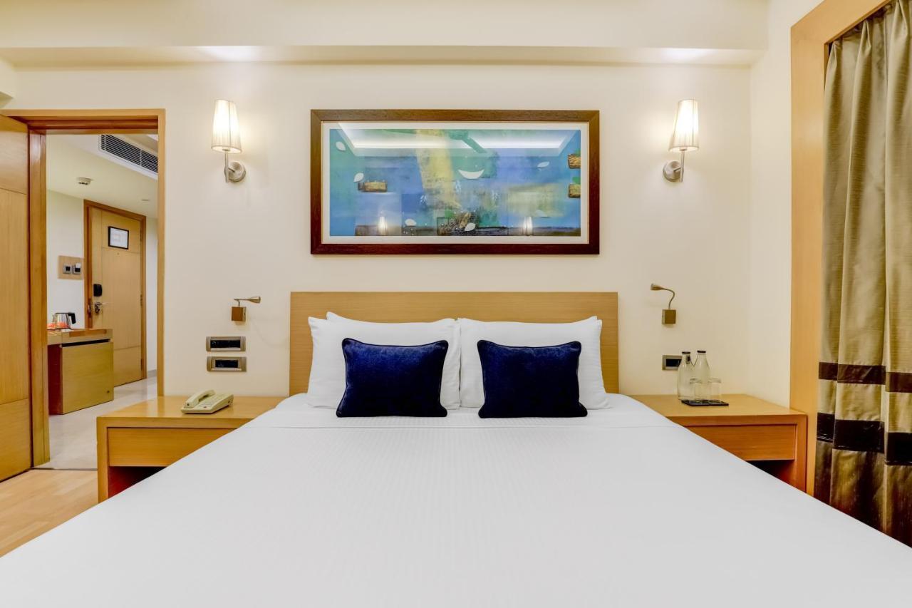 Lemon Tree Premier, Delhi Airport Hotel Új-Delhi Kültér fotó A room at the hotel