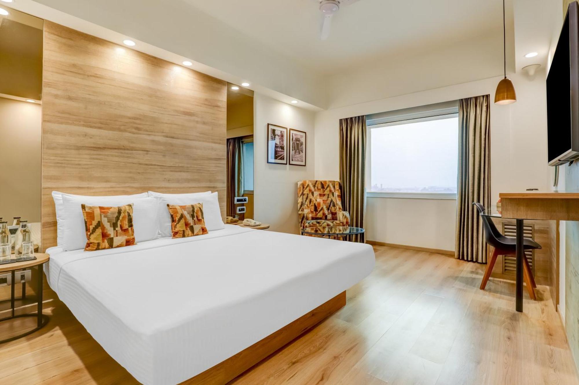 Lemon Tree Premier, Delhi Airport Hotel Új-Delhi Kültér fotó A room at the hotel
