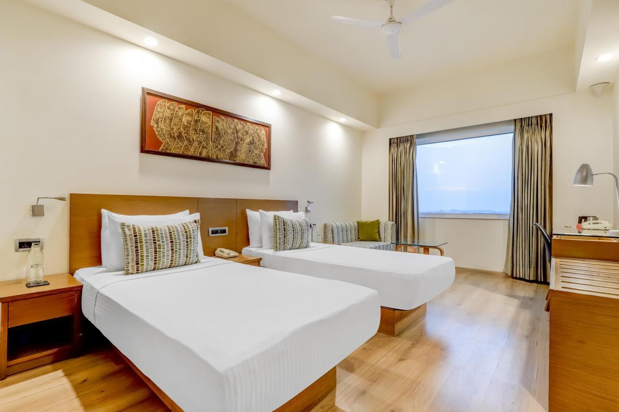 Lemon Tree Premier, Delhi Airport Hotel Új-Delhi Kültér fotó A room at the hotel